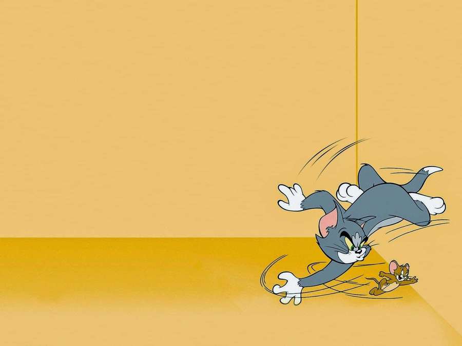 Tom chasing Jerry in a cartoon chase scene on yellow background — Tom And Jerry Background