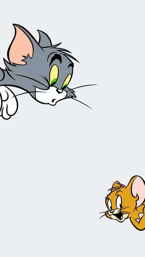 Tom die Katze und Jerry die Maus in einer klassischen Verfolgungsszene. — Tom Hintergrundbild