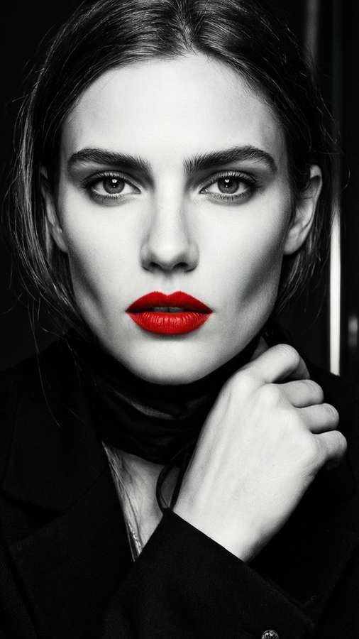 Toni Garrn in a graphic editorial portrait with bold red lips. — Toni Garrn Background