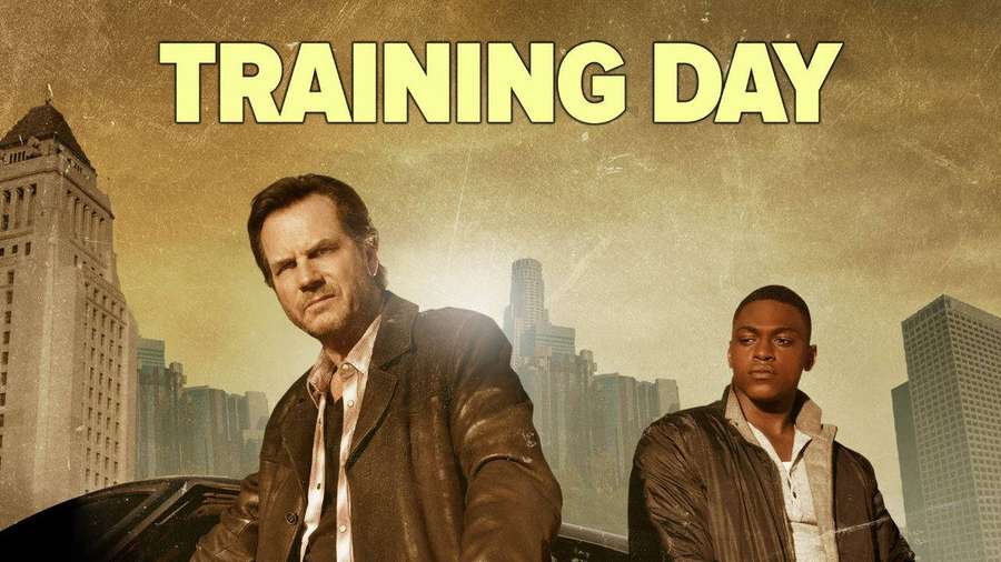 Two men in leather jackets pose against a city skyline at dusk. — Training Day Wallpaper