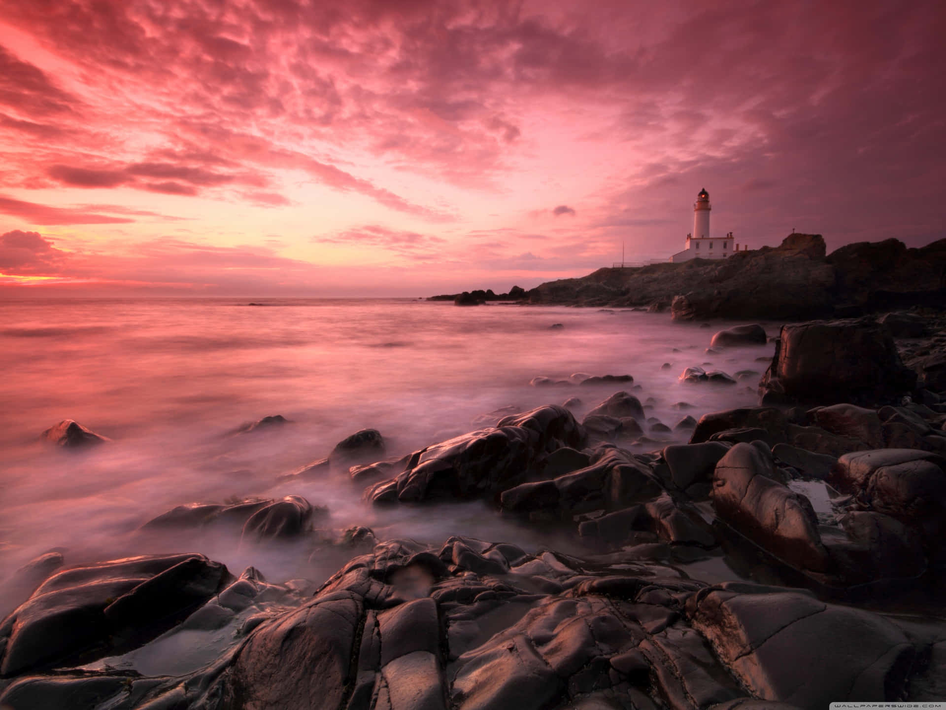 Tramonto Sulla Spiaggia Rosa Sfondo