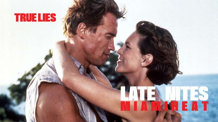 Couple embracing romantically at sunset near ocean with movie titles. — True Lies Wallpaper