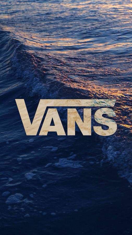 Vans logo superimposed on a rippling ocean wave at sunset. — Vans Background