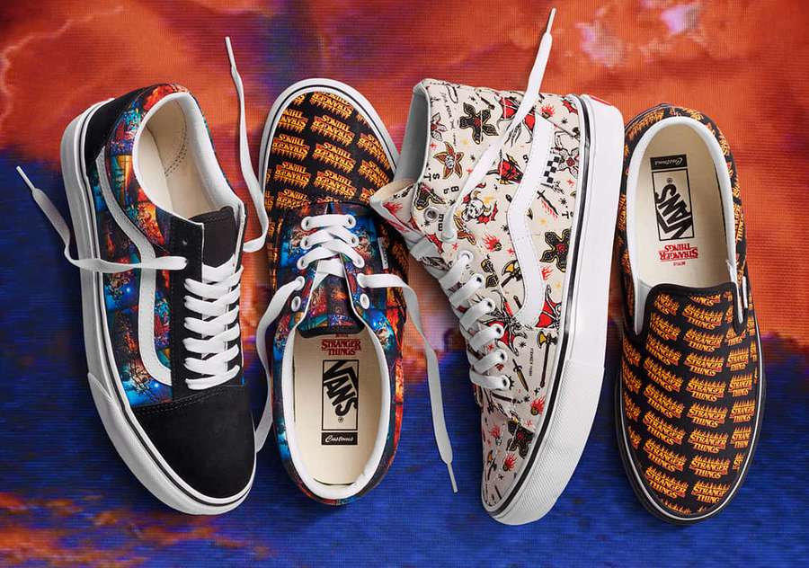 Four Vans sneakers featuring Stranger Things designs on a colorful gradient background. — Vans Picture