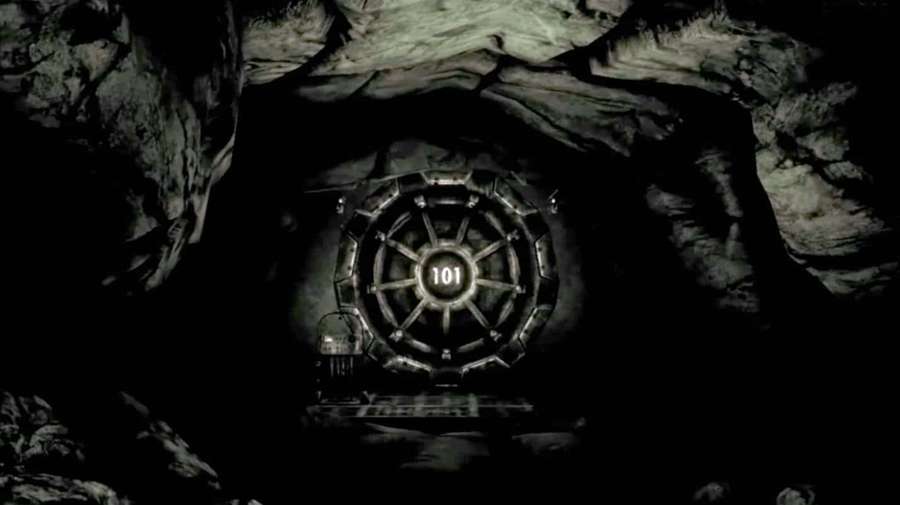 A glowing vault door numbered 101 in a dark cave tunnel. — Vault 101 Wallpaper