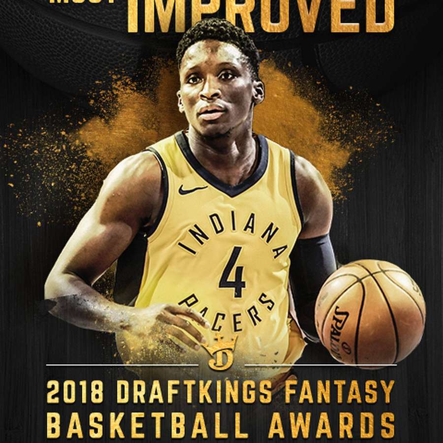 Basketball player in Indiana Pacers jersey holding ball at 2018 DraftKings Fantasy Basketball Awards. — Victor Wallpaper