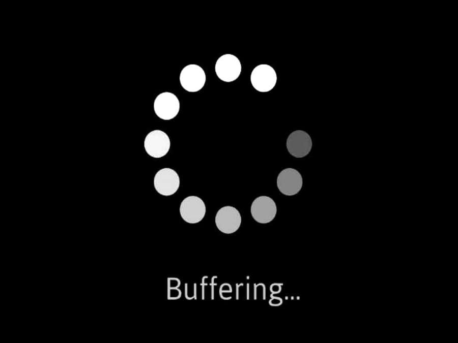 Buffering indicator with white dots on black background — Video Buffering Wallpaper