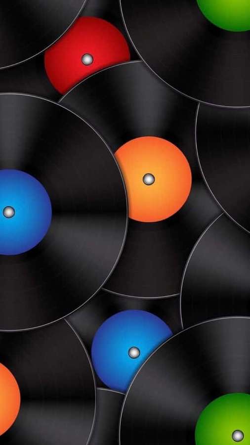 Overlapping vinyl records with colorful centers in a modern abstract pattern. — Vinyl Record Background