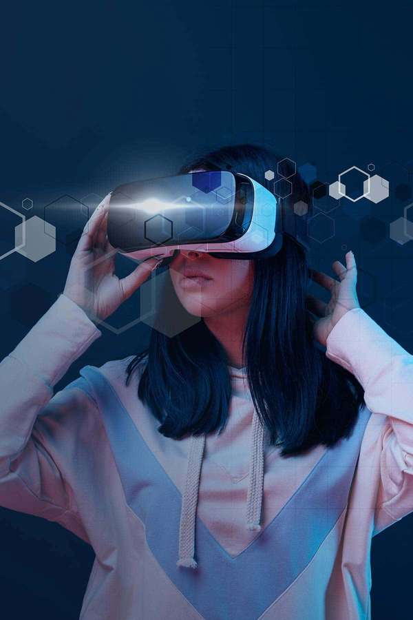 Person wearing VR headset with glowing hexagons floating around them. — Virtual reality Wallpaper