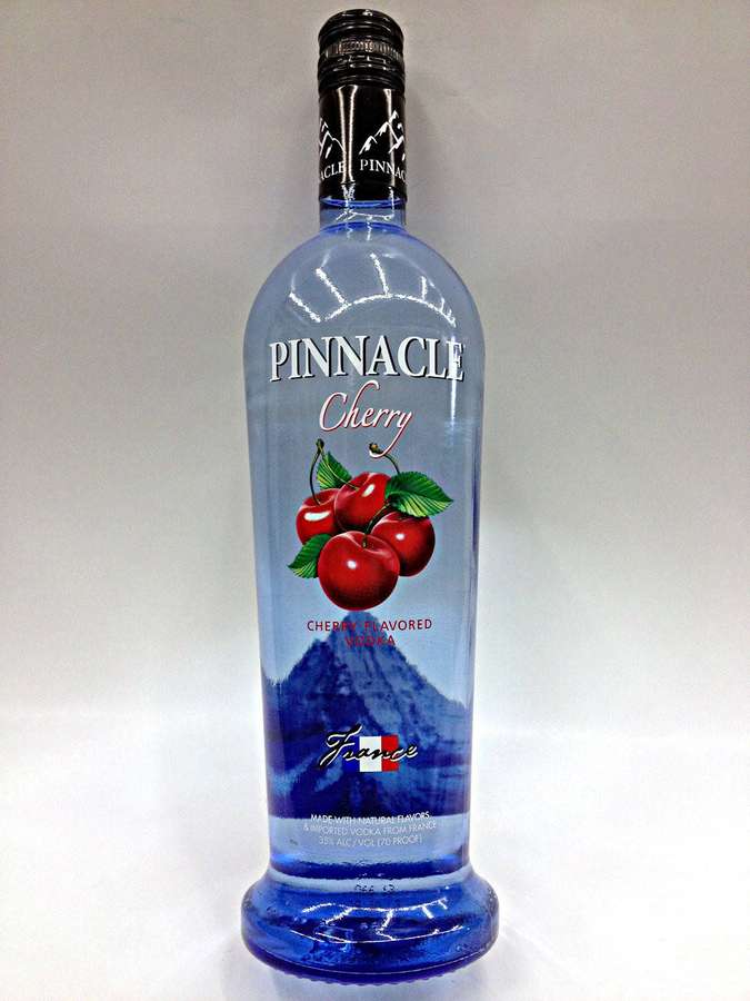 Garrafa azul de vodka Pinnacle Cherry com ilustração de cereja e design de montanha. — Vodca Pinnacle Papéis de Parede