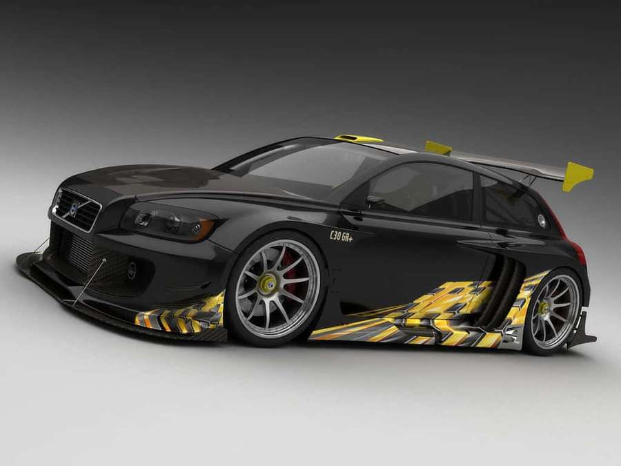 Black Volvo race car with yellow accents and aerodynamic features in studio lighting. — Volvo C30 Wallpaper