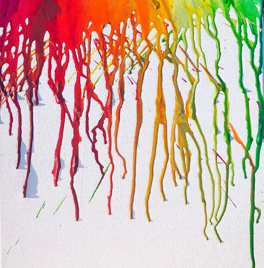 Bold rainbow paint drips flowing down a white textured canvas. — Wax Wallpaper
