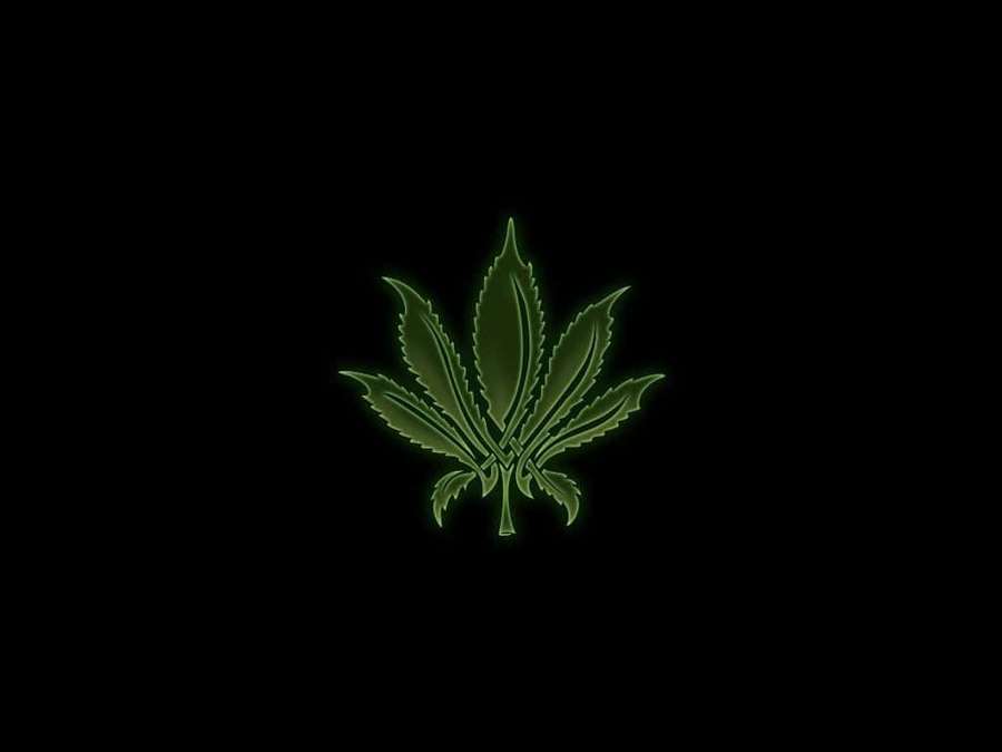 Glowing green cannabis leaf icon on black background — Weed Leaf Background