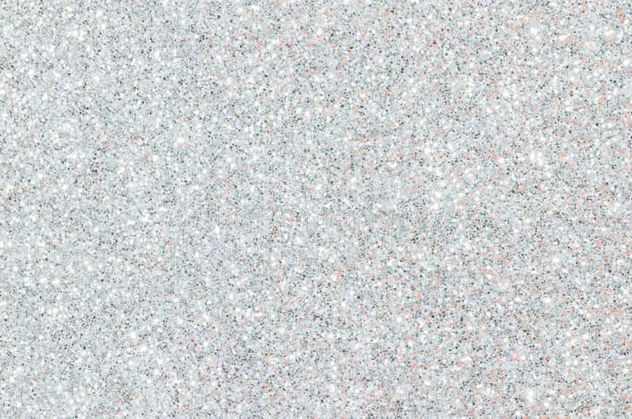 Close-up of speckled granite with white gray black and pink flecks. — White Glitter Background