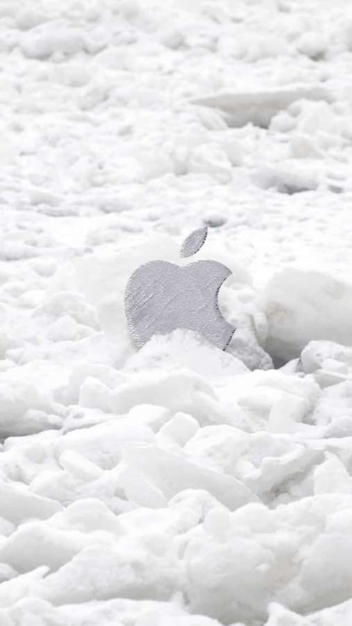 Silver Apple logo partially covered in snow — White iPhone Background