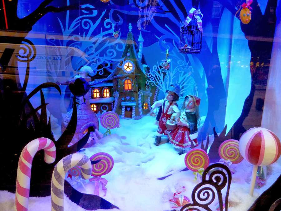 Fairy tale scene with candy cane trees and a glowing gingerbread house in snowy twilight. — Whoville Background
