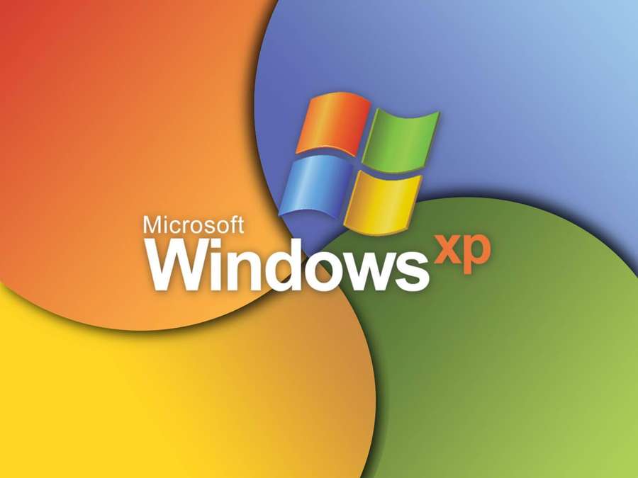 Windows XP logo on colorful overlapping circles background — Windows Xp Background