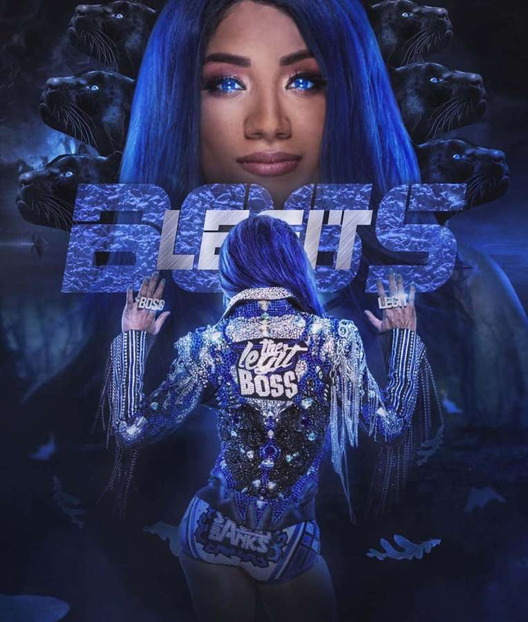 Uma mulher com cabelo azul e olhos brilhantes usa um traje azul cintilante com 'the legit boss' nas costas. — WWE next Papéis de Parede