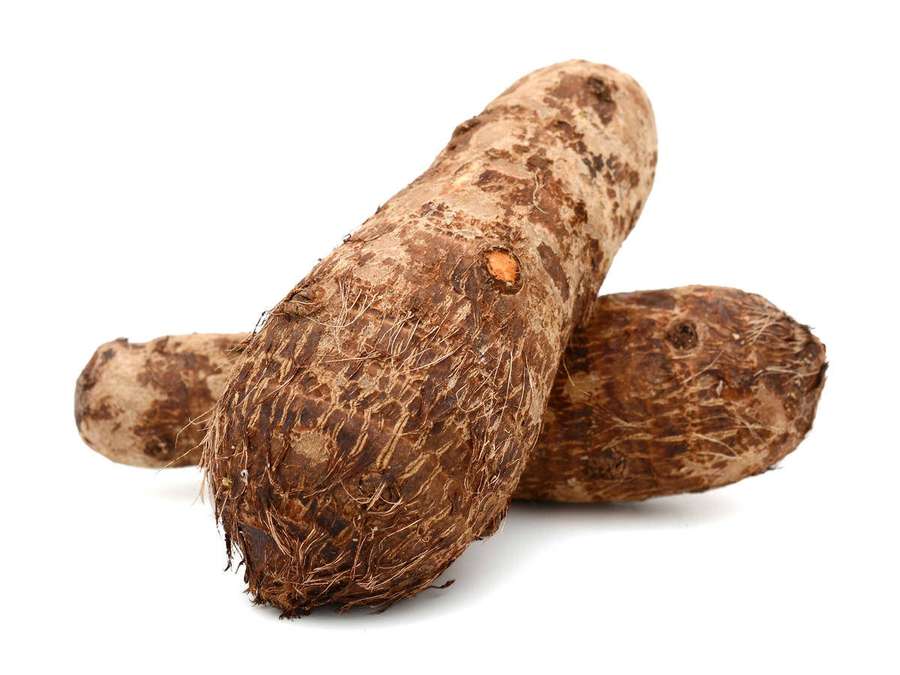 Three brown taro roots with fibrous skin on white background — Yam Wallpaper