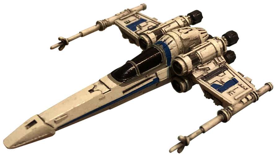 Maalattu malli X-wing-tähtihävittäjästä, jossa on siniset korostukset ja sään kuluttama pinta. — Z-95 Headhunter Taustakuvat