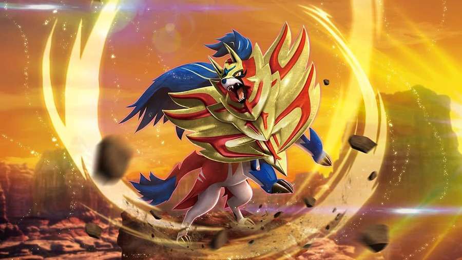 A powerful dragon-like creature unleashing energy in a desert canyon at sunset. — Zamazenta Wallpaper