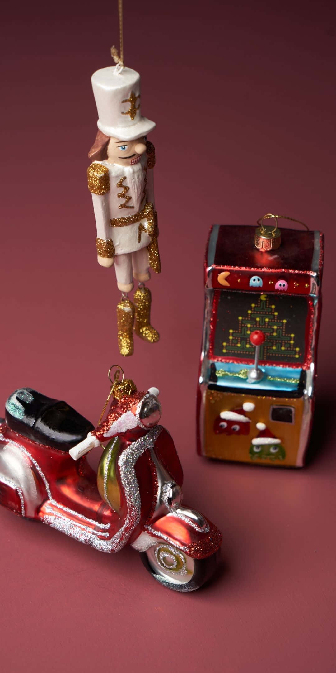 A Nutcracker Ornament And A Motorcycle Ornament Background