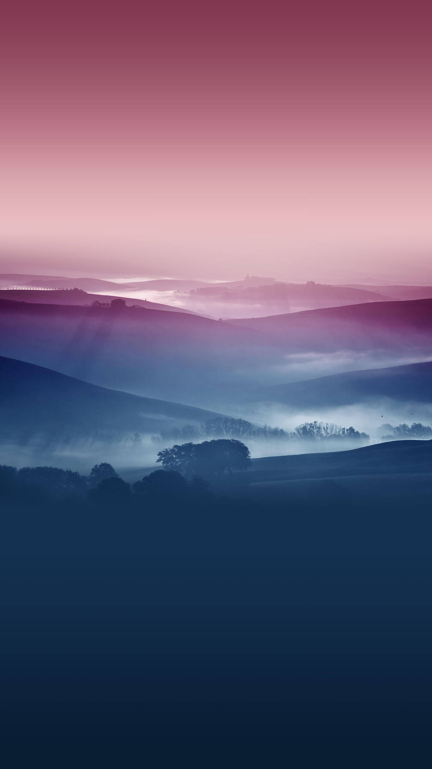 A Pink And Purple Landscape With Fog Background