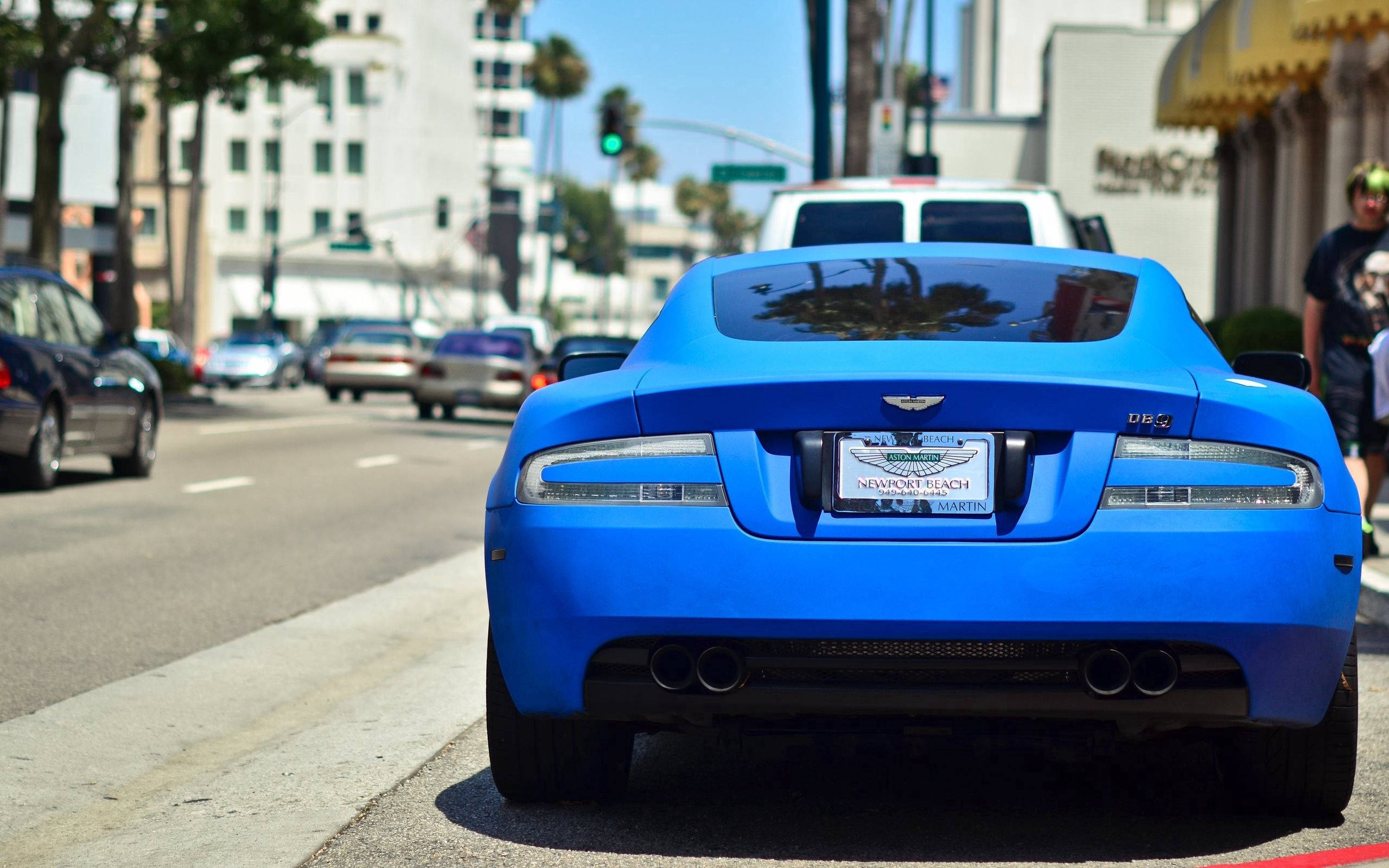 Aston Martin Blue Sports Car Background