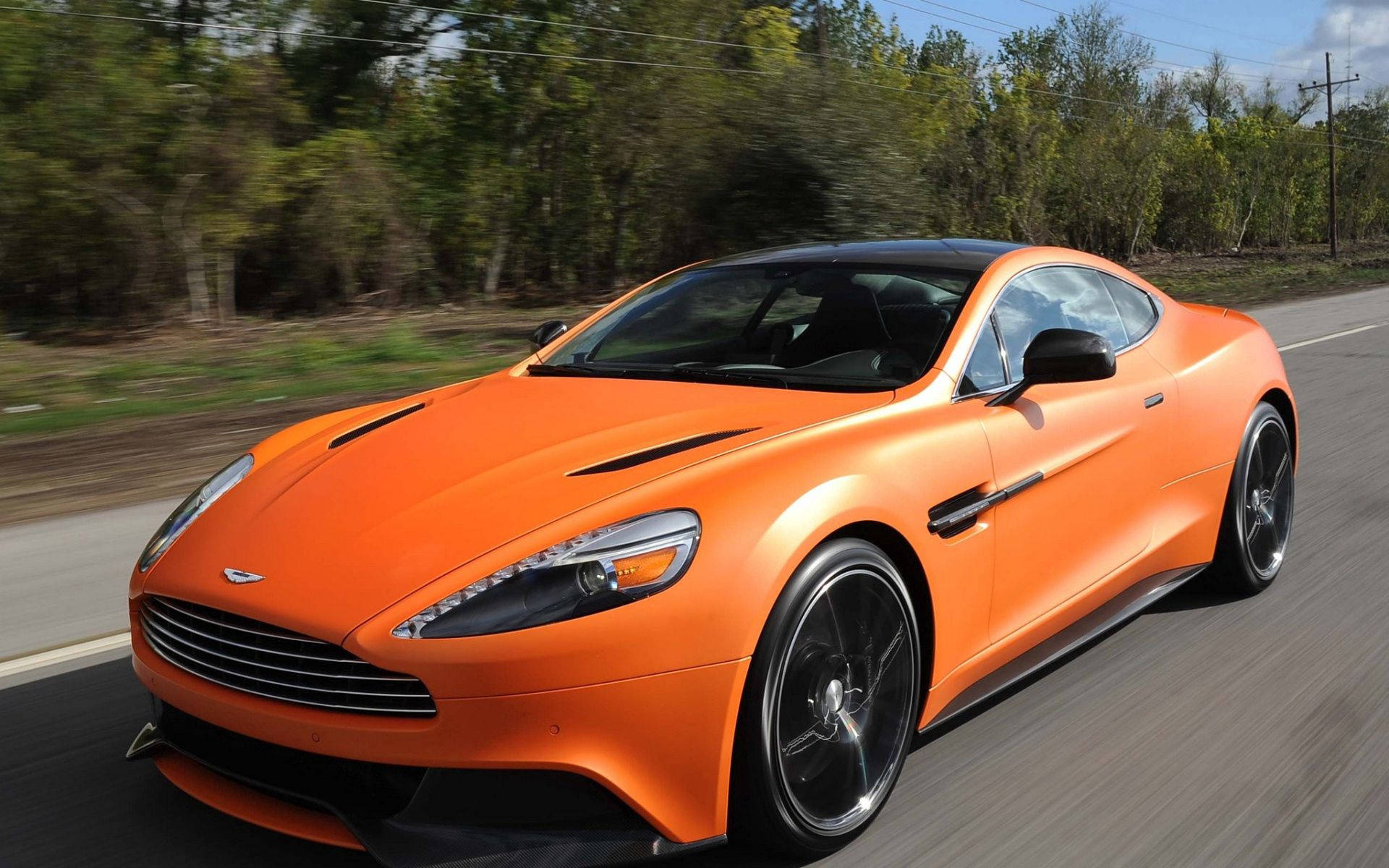 Aston Martin Orange Virage Background