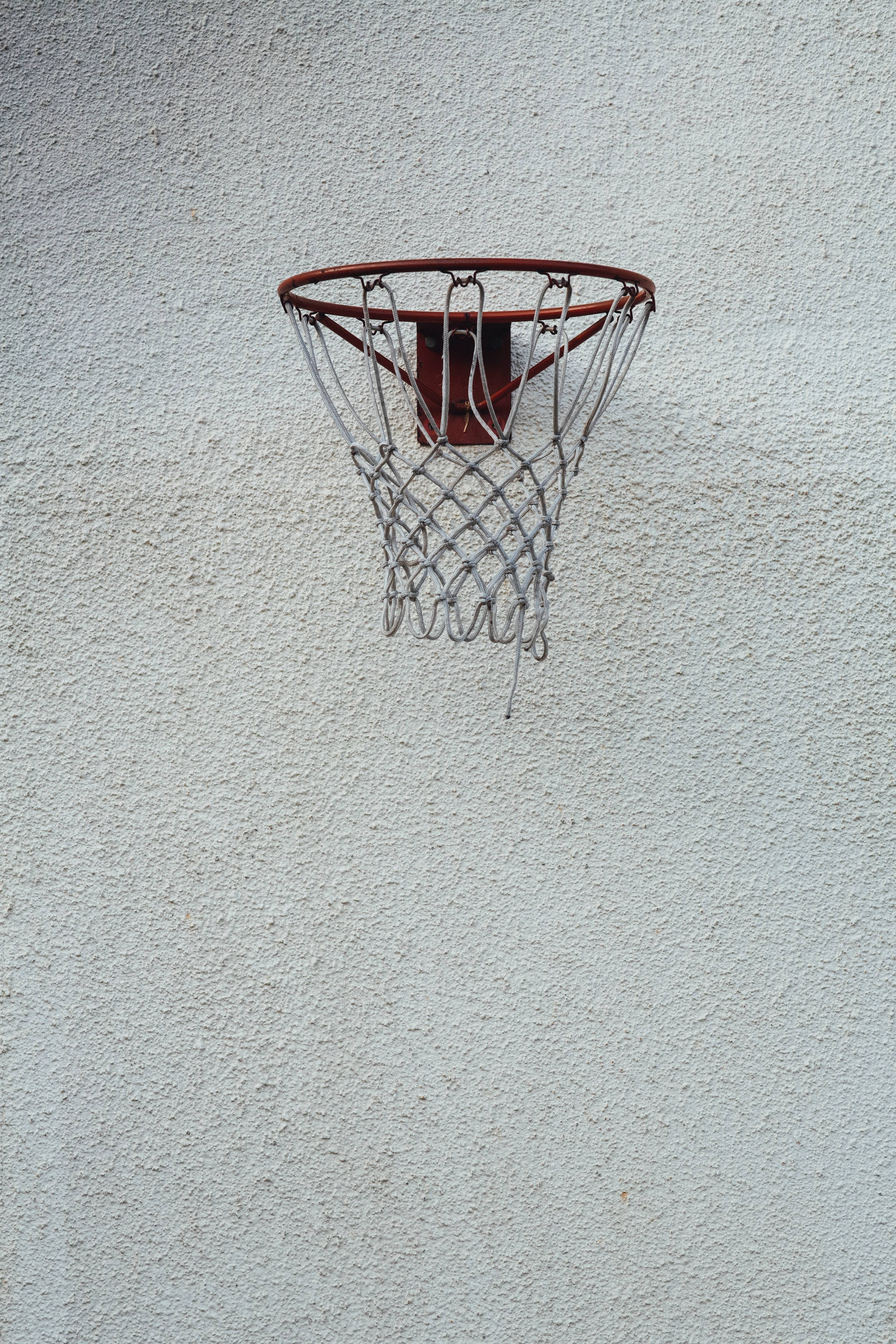Basketball Hoop Net On White Wall Background