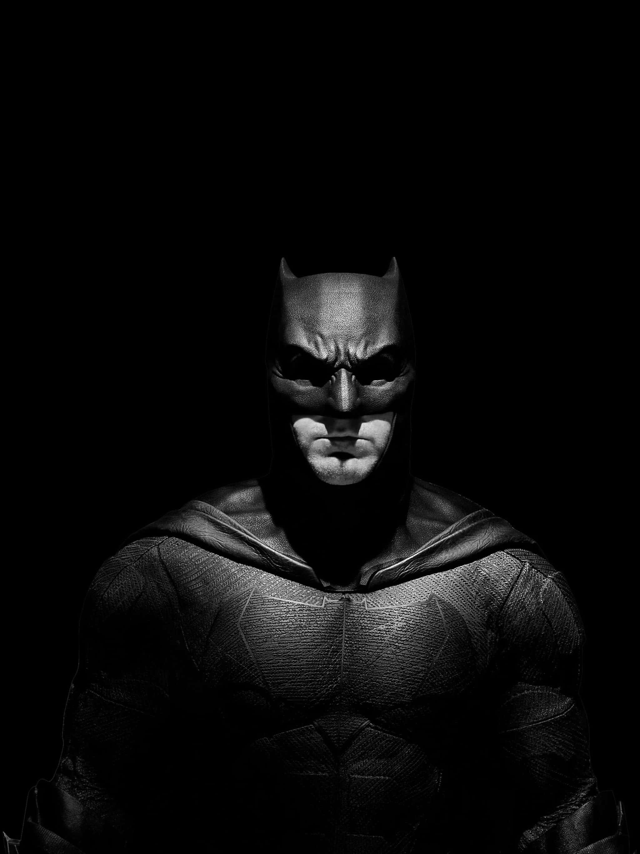 Download Batman taking over the cityscape in black and white Wallpaper ...