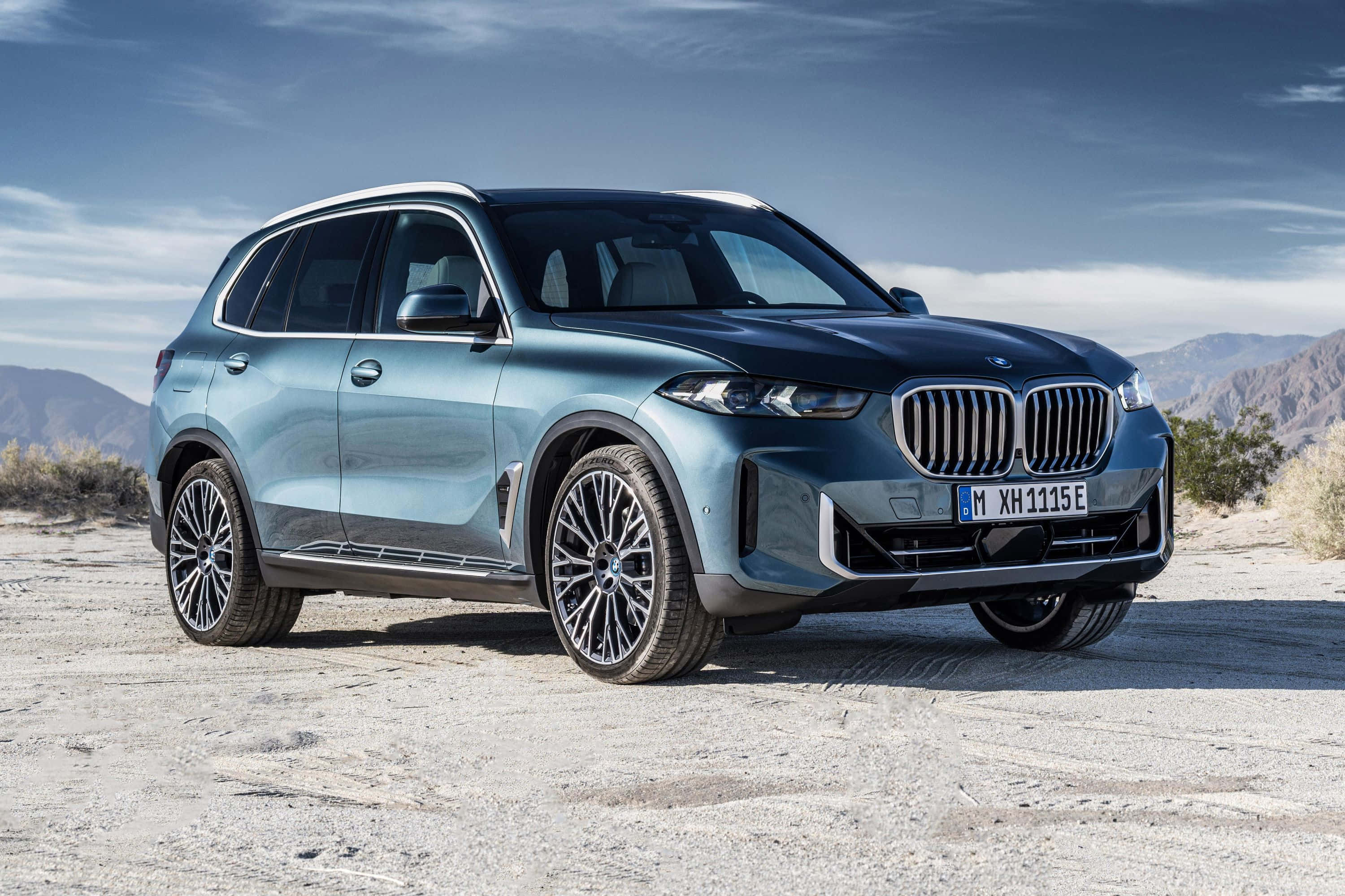 Download BMW X5 Elegance in Motion Wallpaper | Wallpapers.com