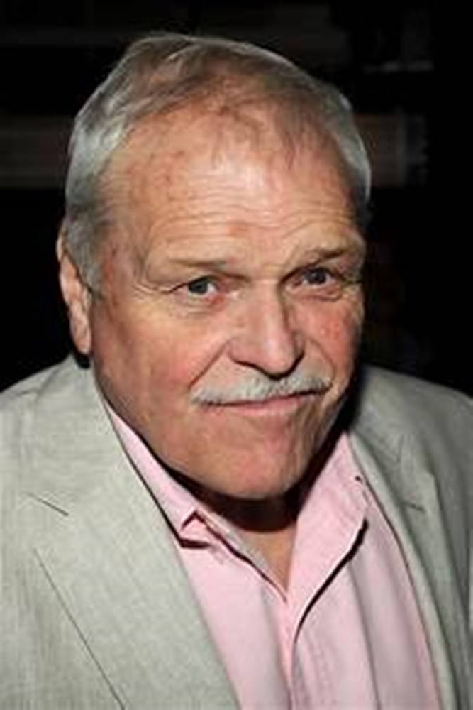 Download Brian Dennehy Pink And Gray Wallpaper | Wallpapers.com