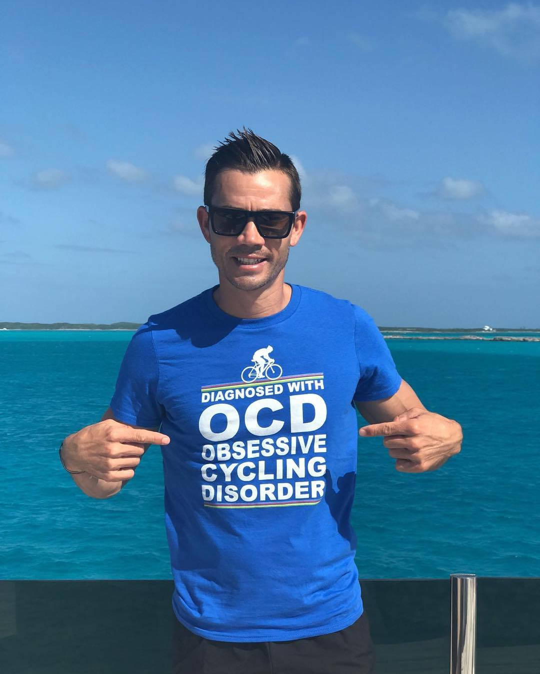 Download Camilo Villegas Blue Shirt Wallpaper | Wallpapers.com