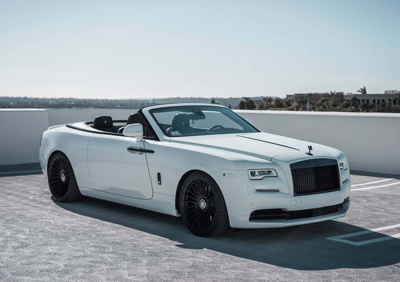 Download The Elegant Power Of Rolls Royce Dawn Wallpaper | Wallpapers.com