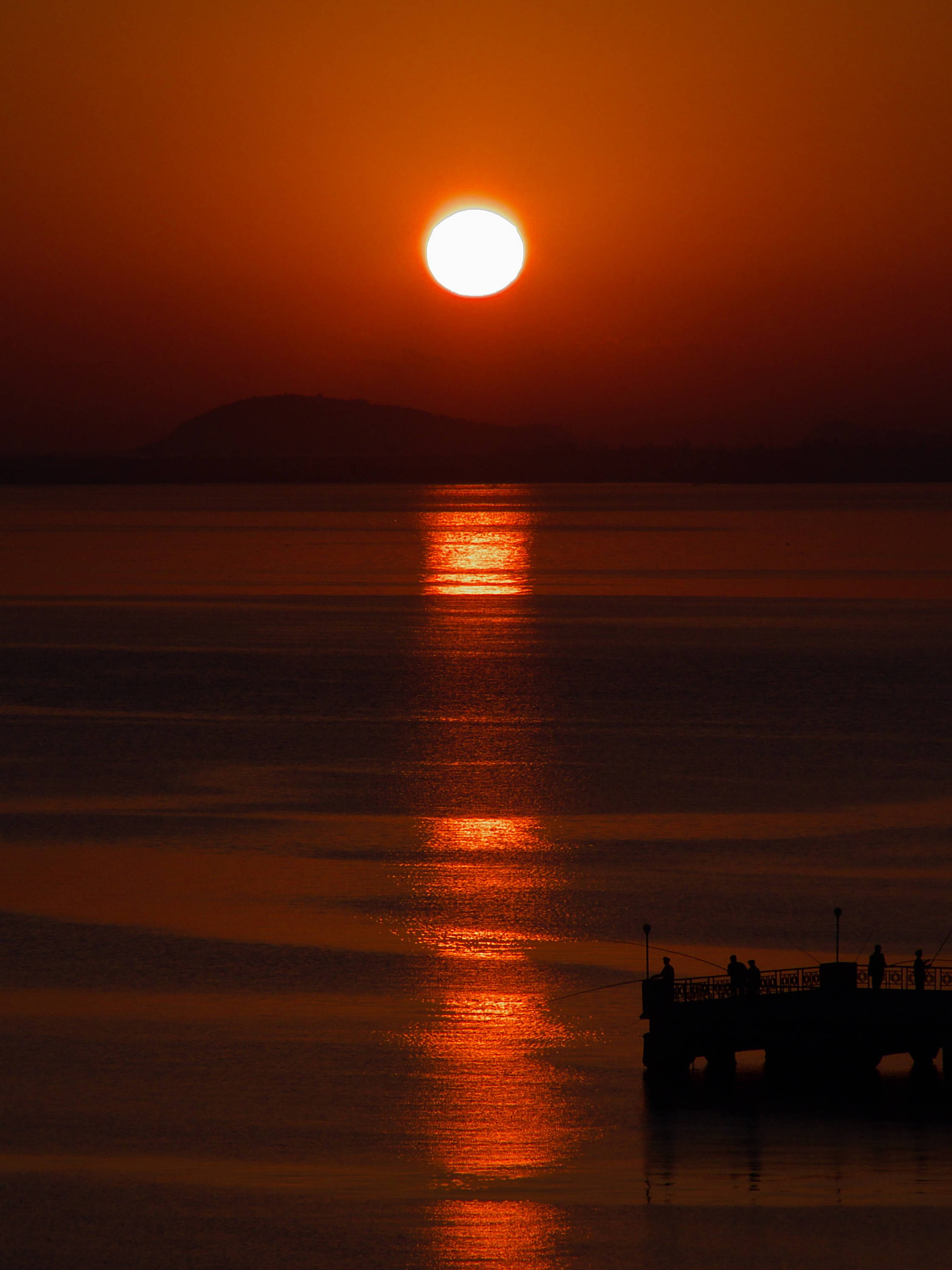 Fishermen Silhouettes Sea Sunrise Background