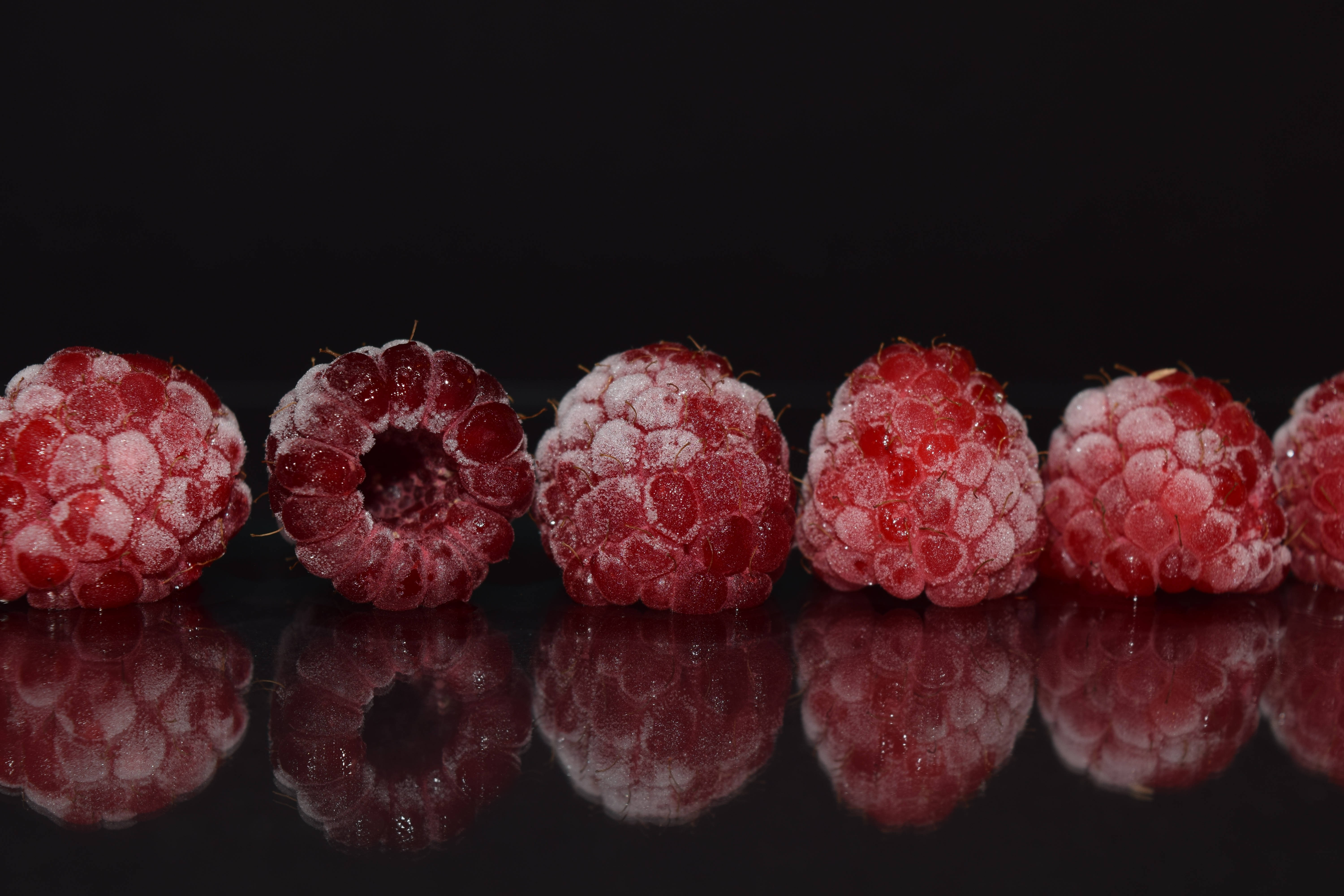 Frozen Raspberries Reflection Background
