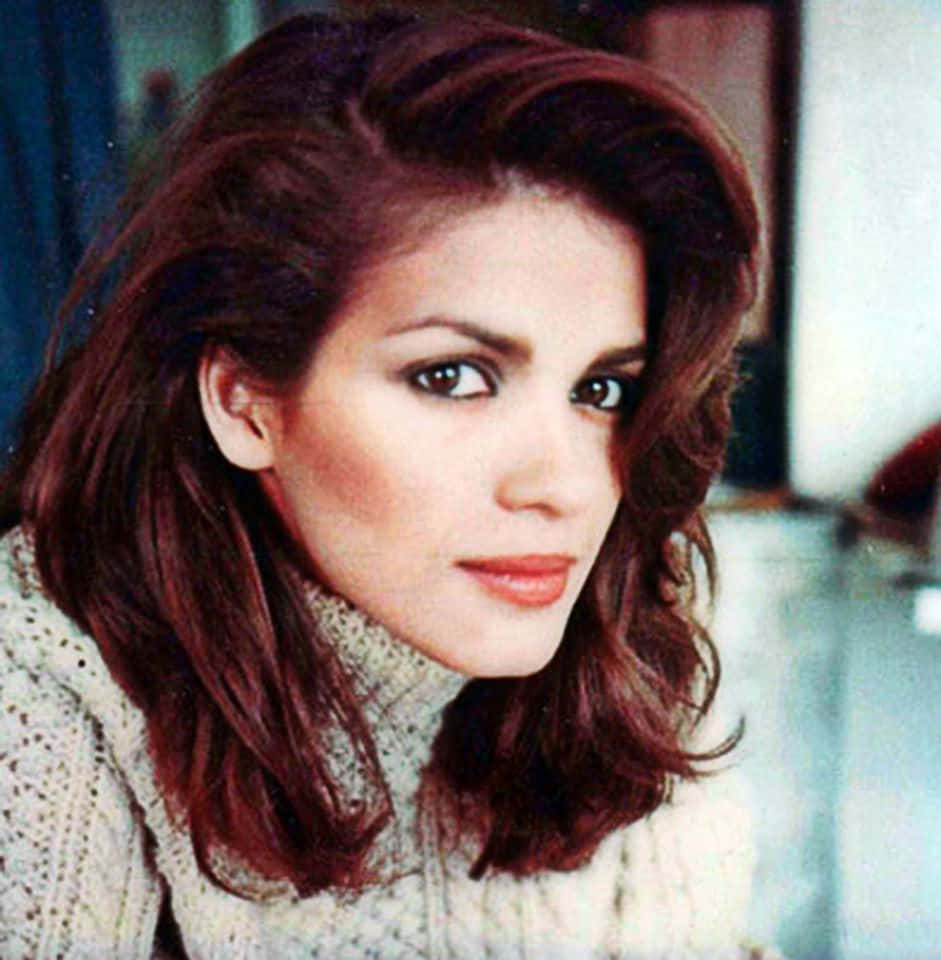 Download A Stunning Shot Of Model Gia Carangi Wallpaper | Wallpapers.com