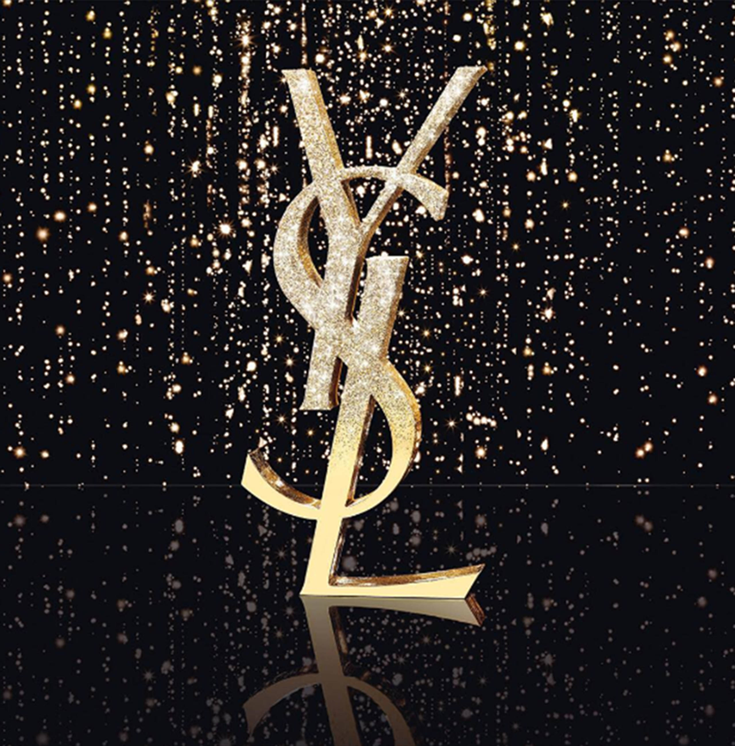 Download Gold Aesthetic Ysl Logo Wallpaper | Wallpapers.com