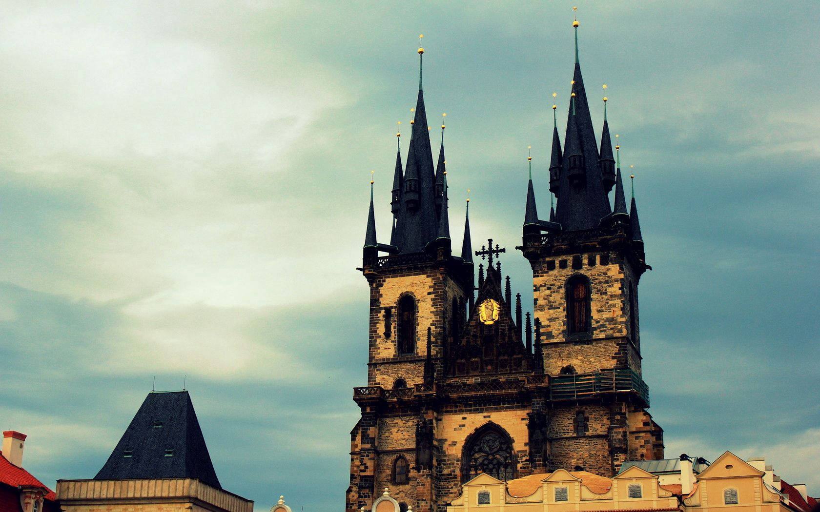 Gothic Church Towers In Prague Background