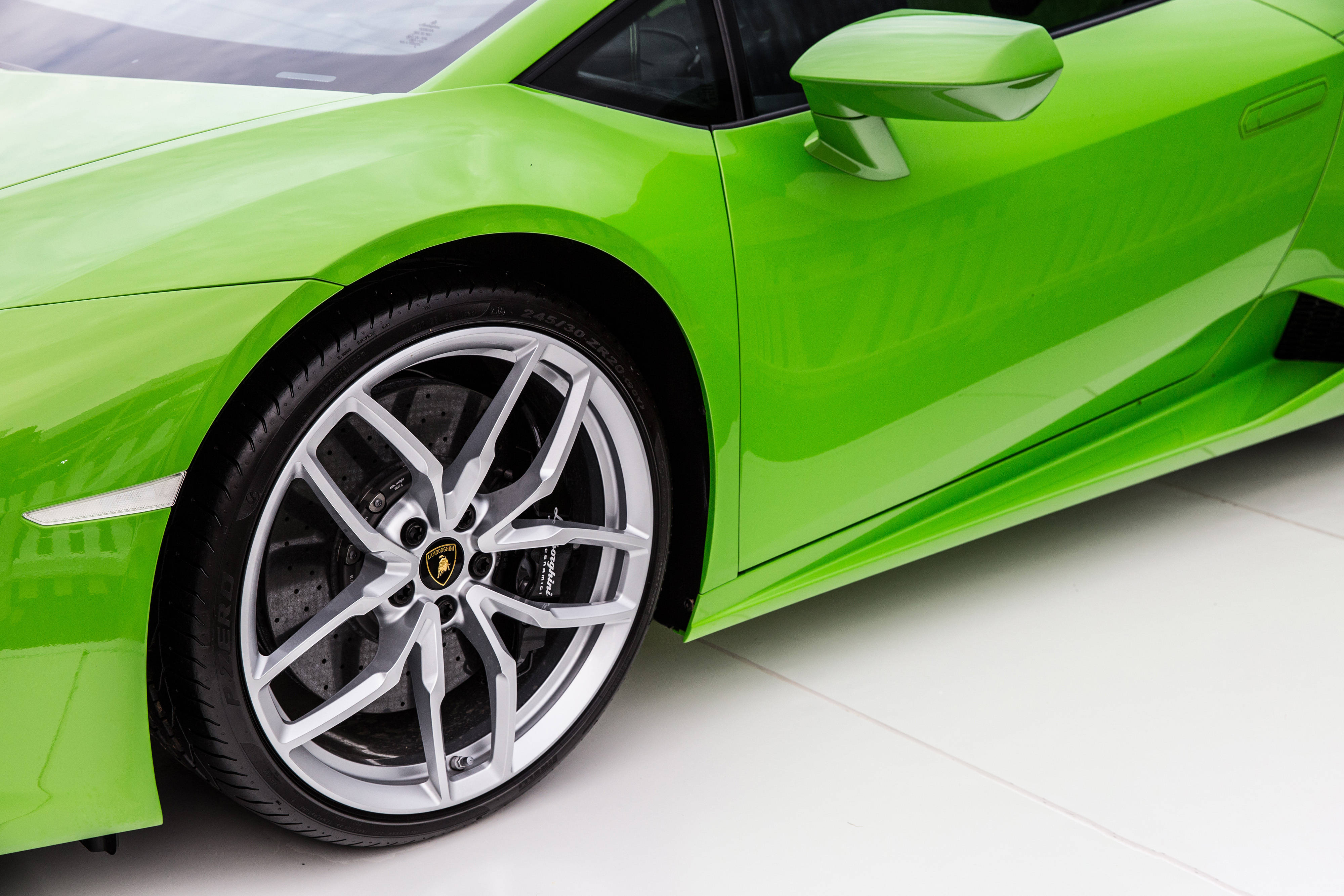 Green Lamborghini Wheel Close Up Background