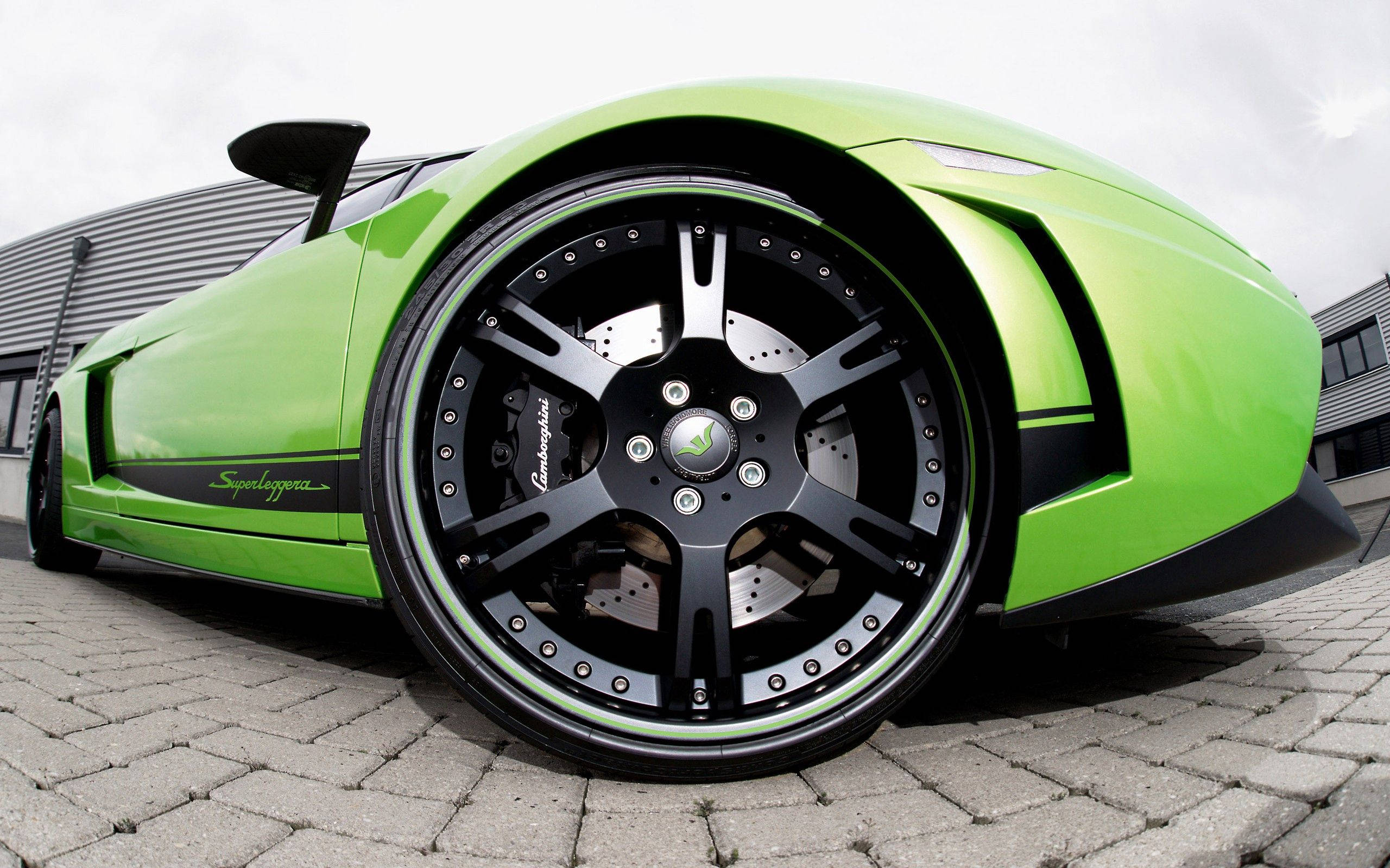 Green Lamborghini Wheel Fisheye View Background