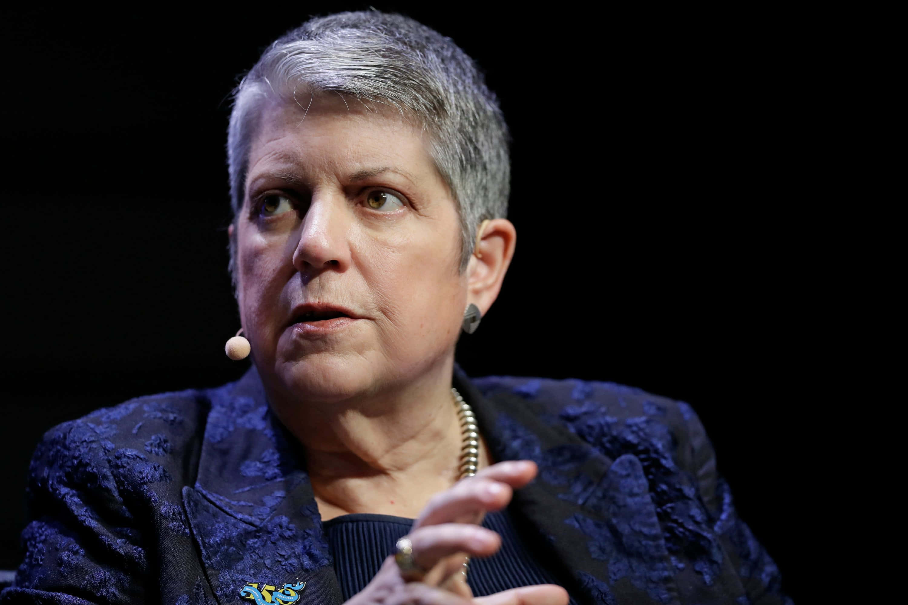 Download Janet Napolitano On Black Backdrop Wallpaper | Wallpapers.com