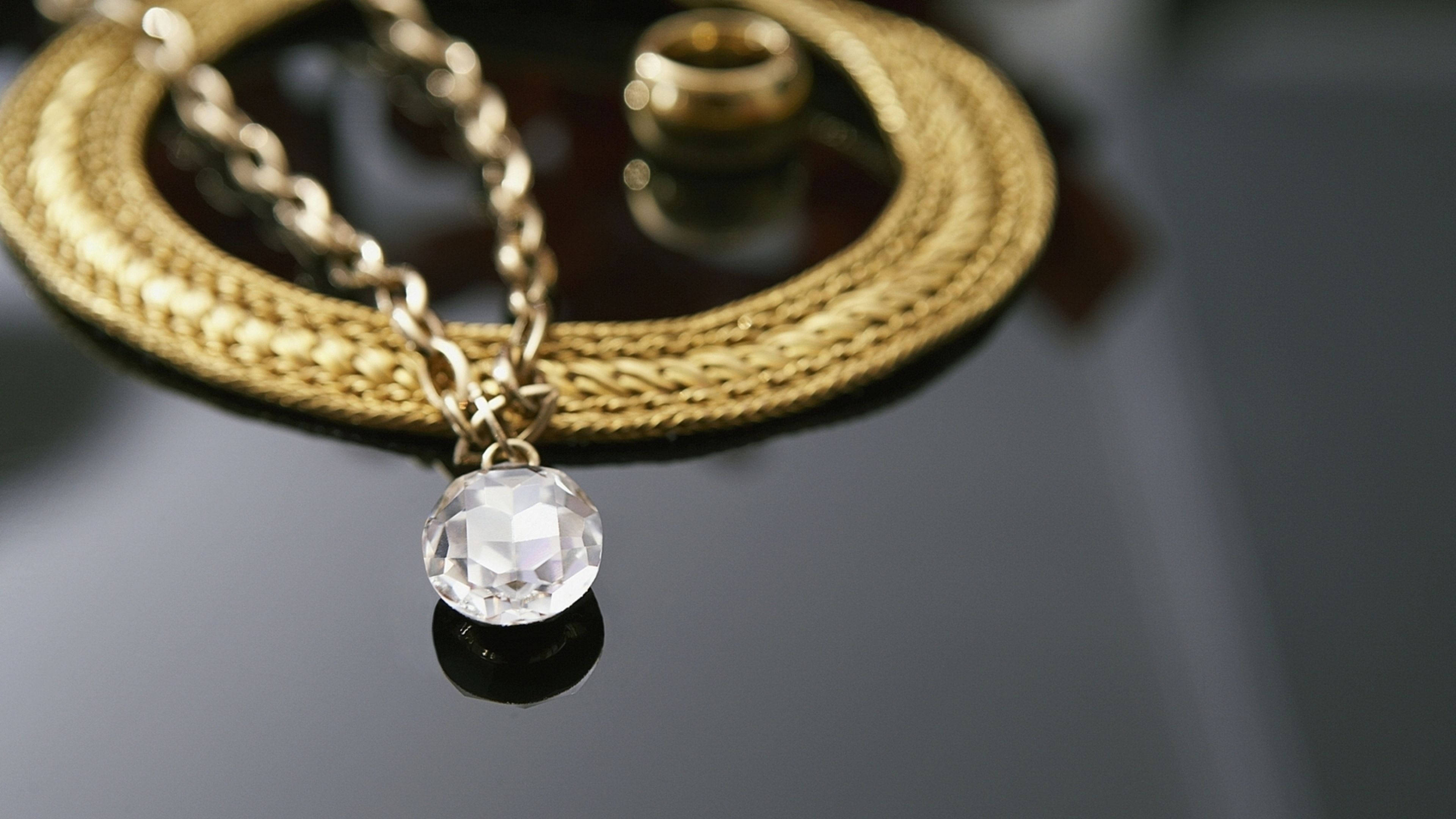 Download Jewelry Necklace With Diamond Pendant Wallpaper | Wallpapers.com