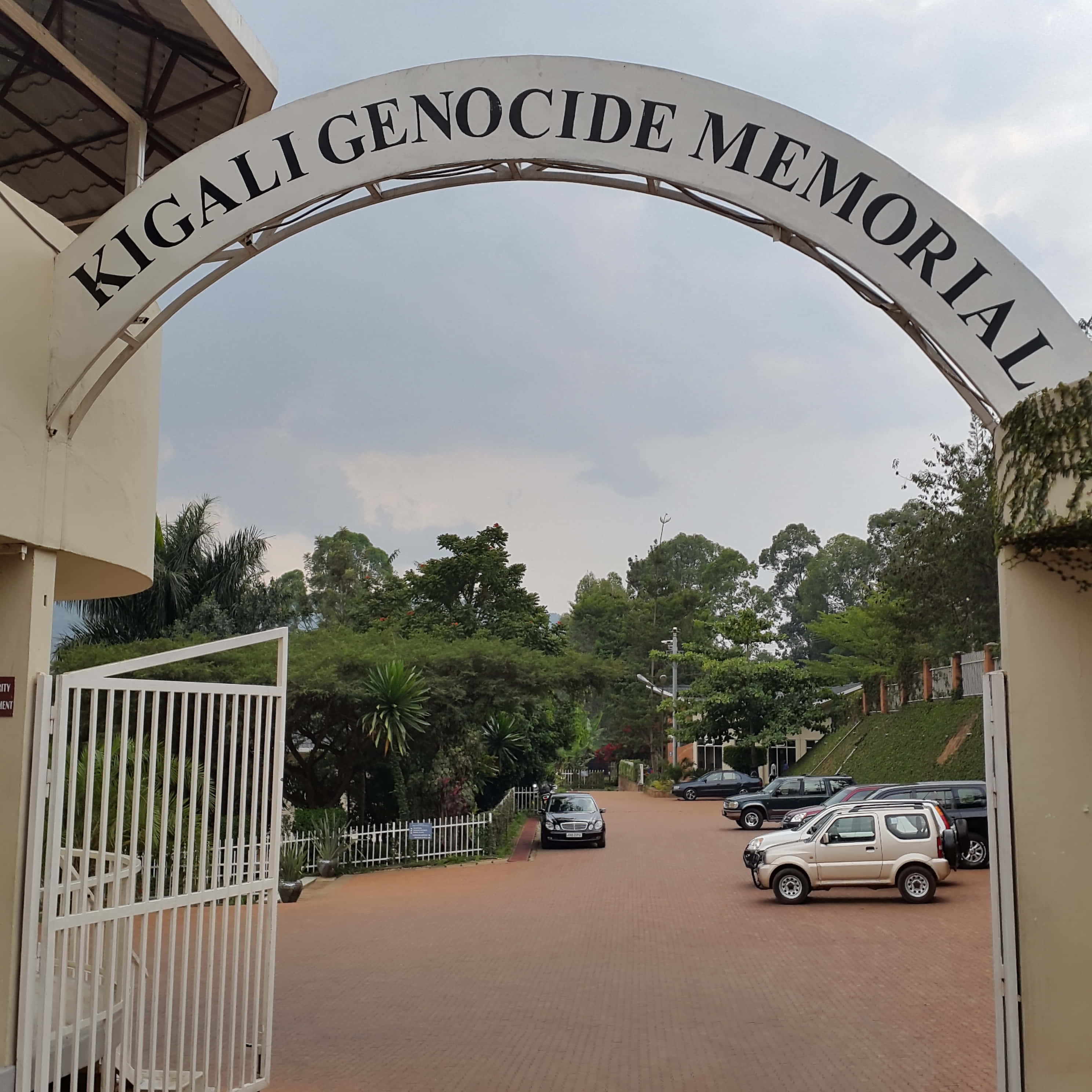 Download Woman At Kigali Genocide Memorial Black Wall Wallpaper