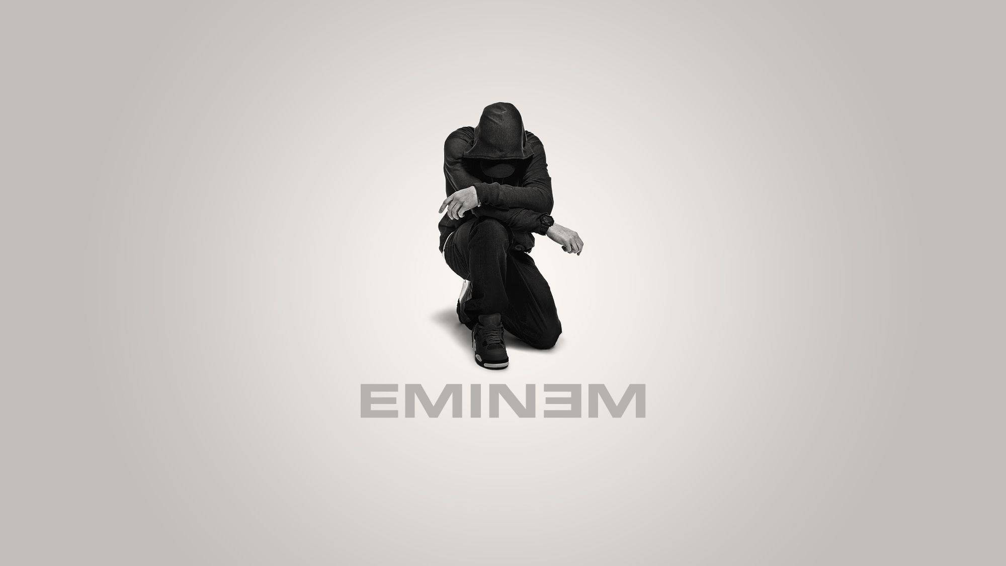 Download Kneeling Eminem In Black Wallpaper 