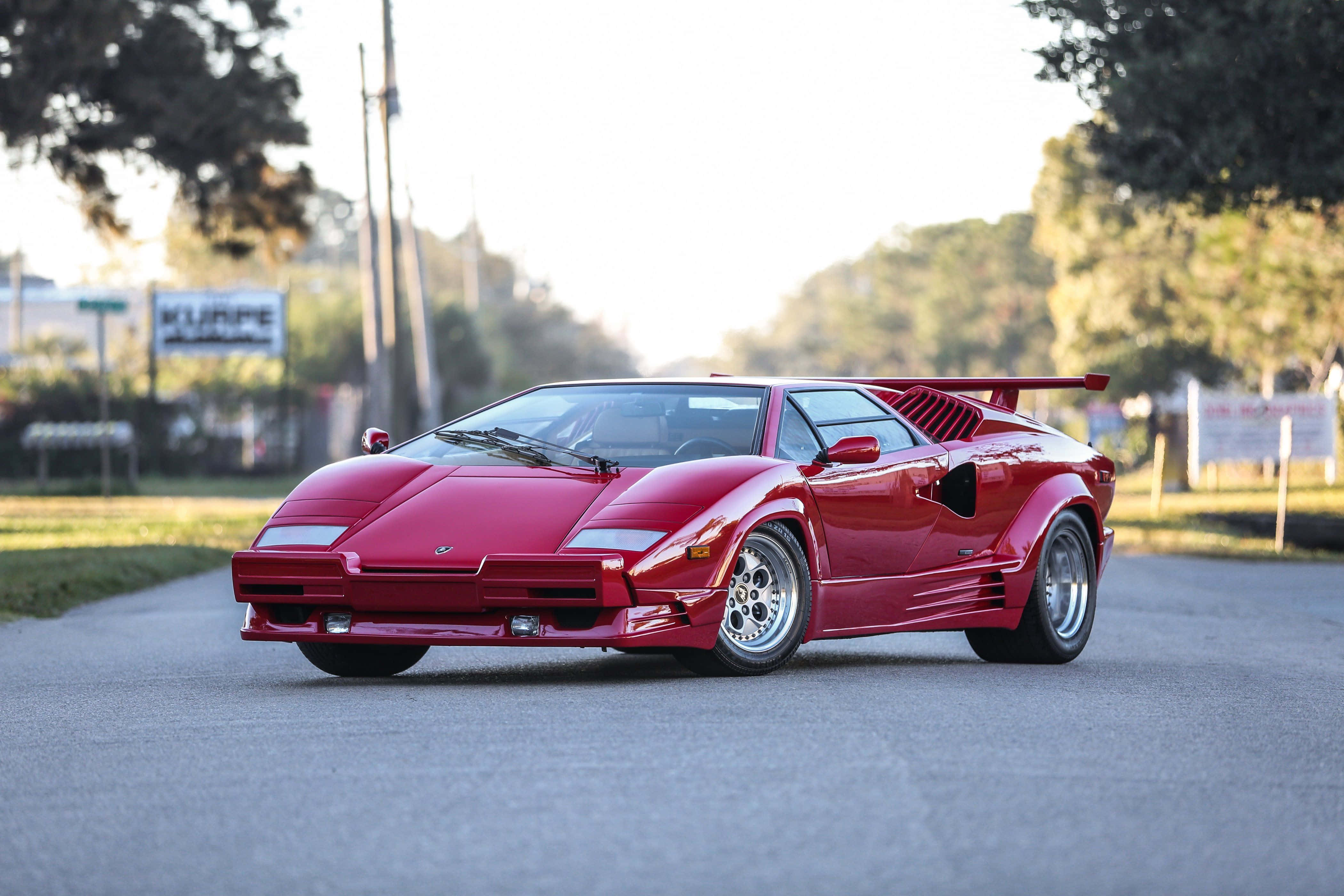 Download Lamborghini Countach Glows in the Night Wallpaper | Wallpapers.com