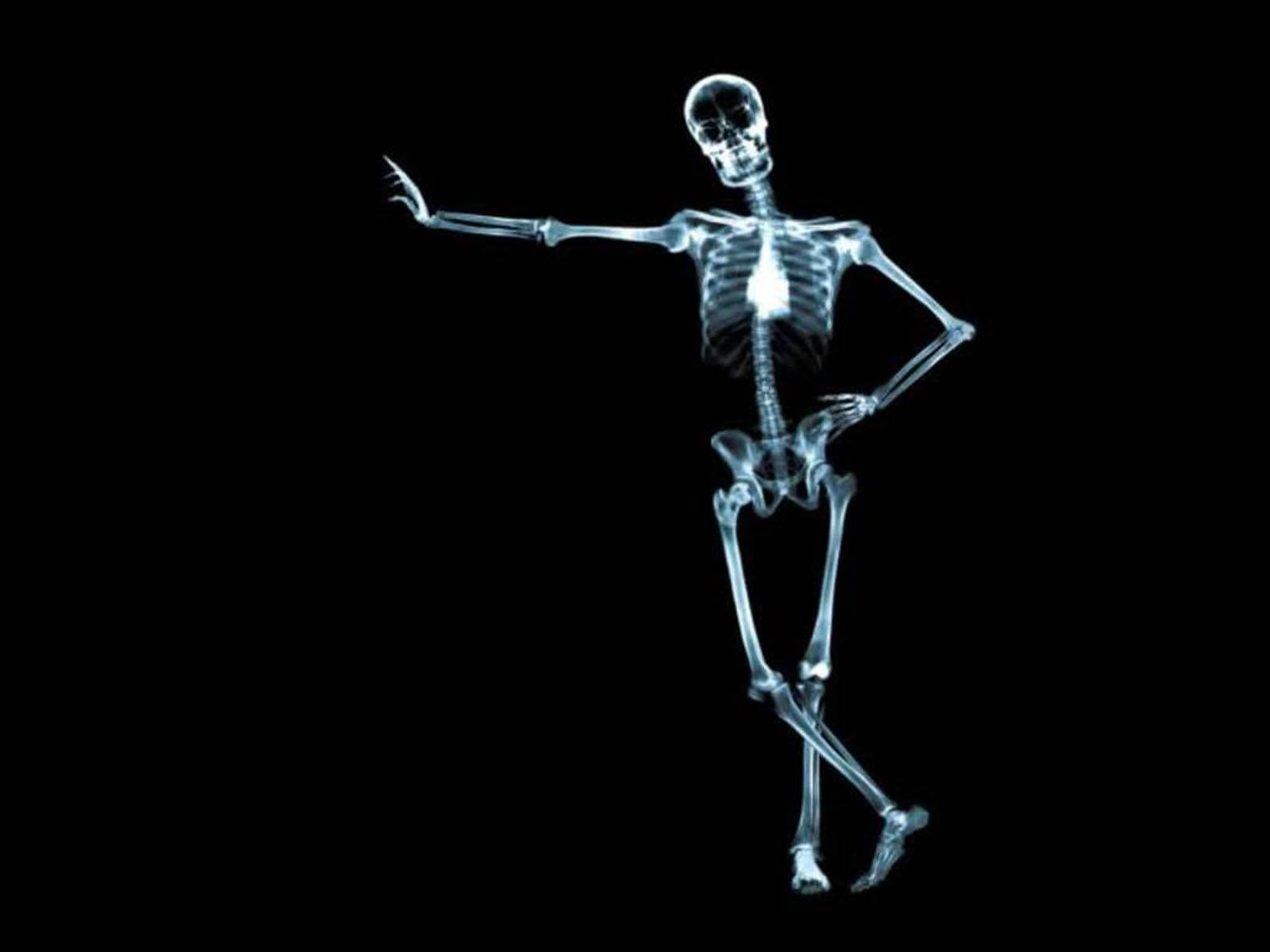 Leaning White Skeleton Background
