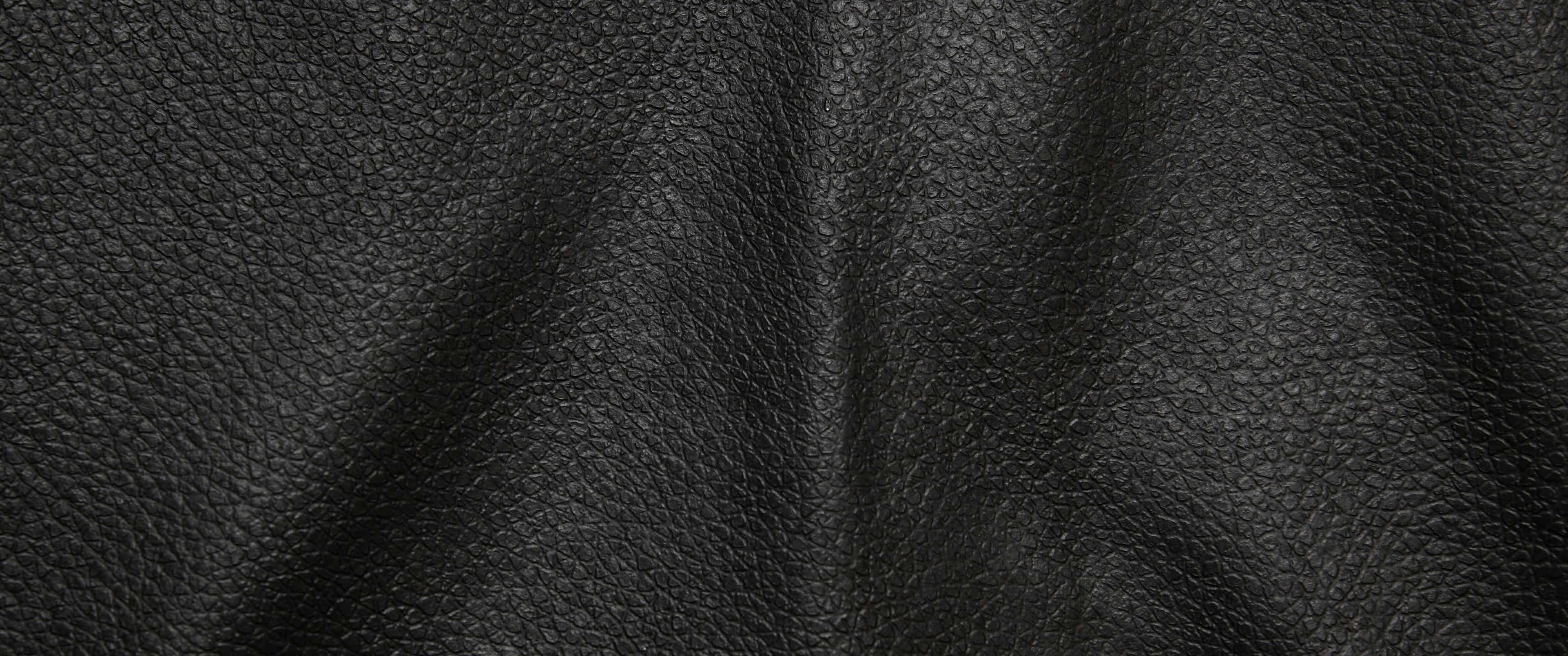 Download Leather Texture Black Bulges Wallpaper | Wallpapers.com