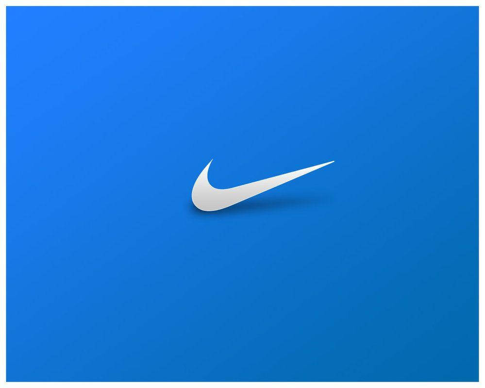 Nike Logo On A Blue Background Background